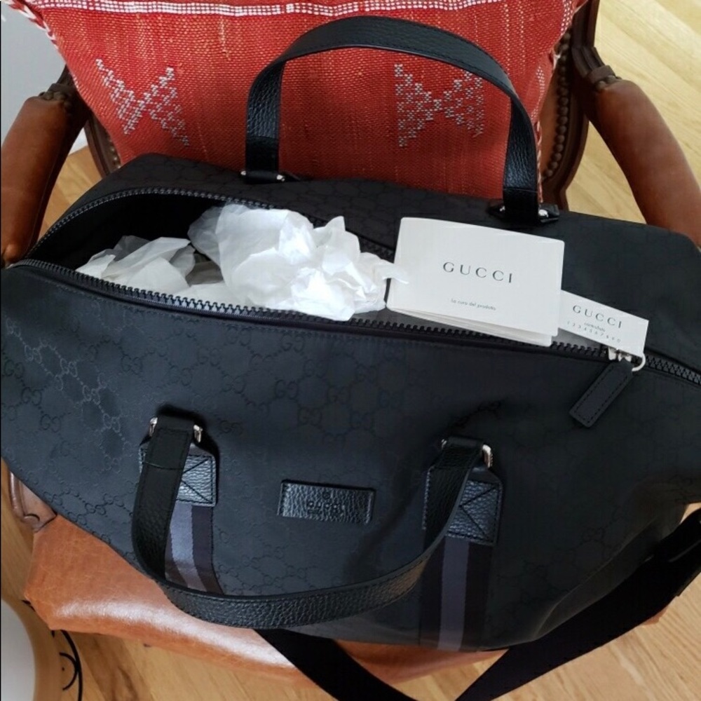 Sold...gucci weekender traveling bag